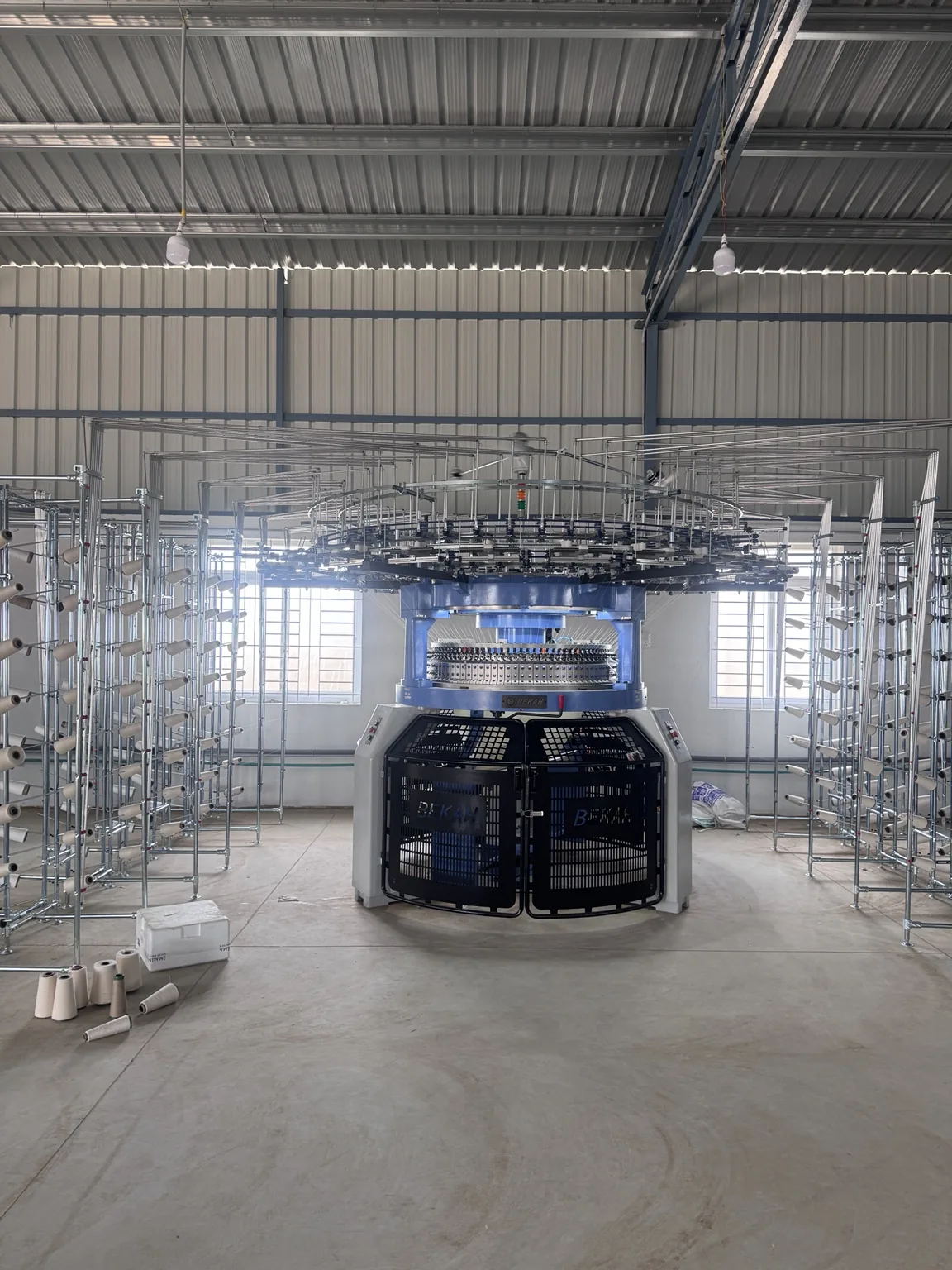 Bekah circular rib knitting machine and yarn creel at Kanik Fabrics